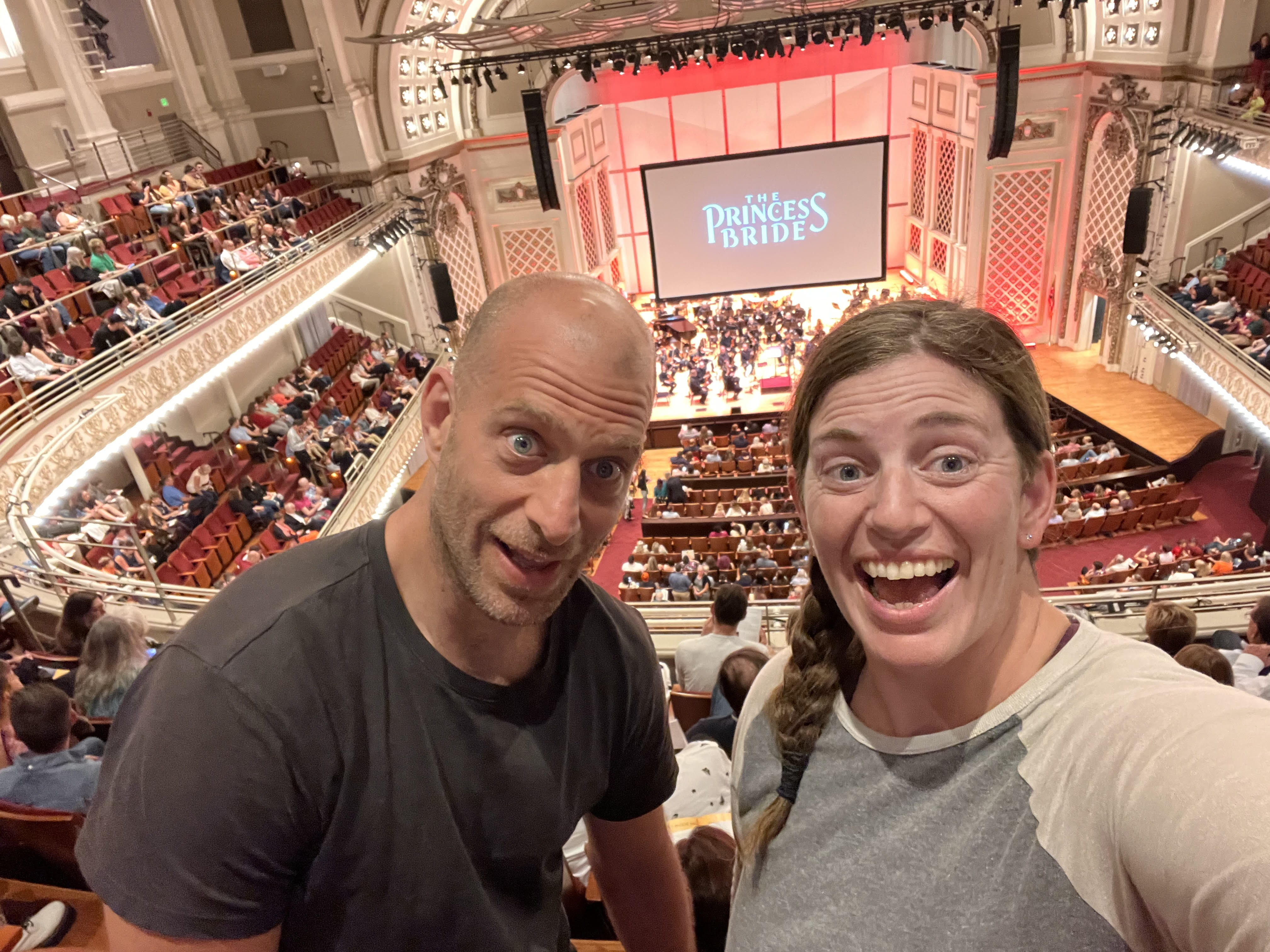 Eric with his sister at a venue.